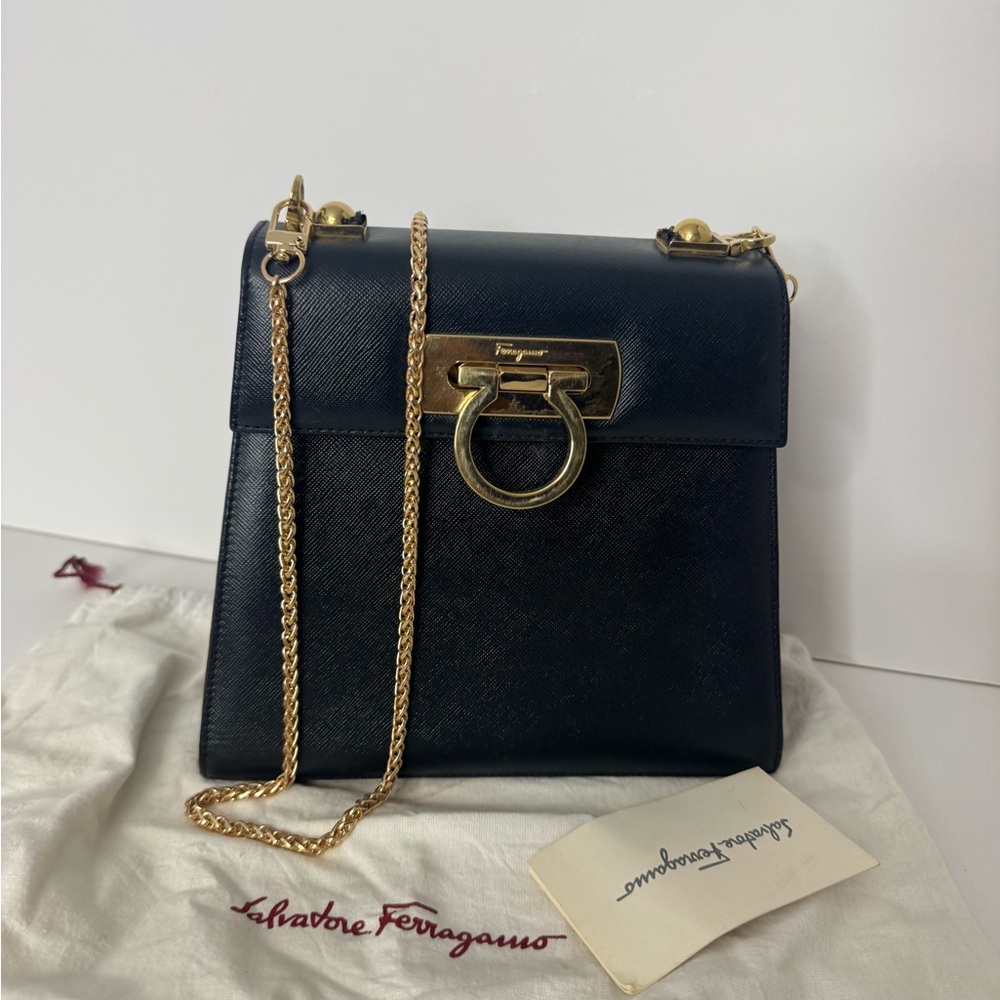 Salvatore Ferragamo Crossbody Bag with Gold Hardware.